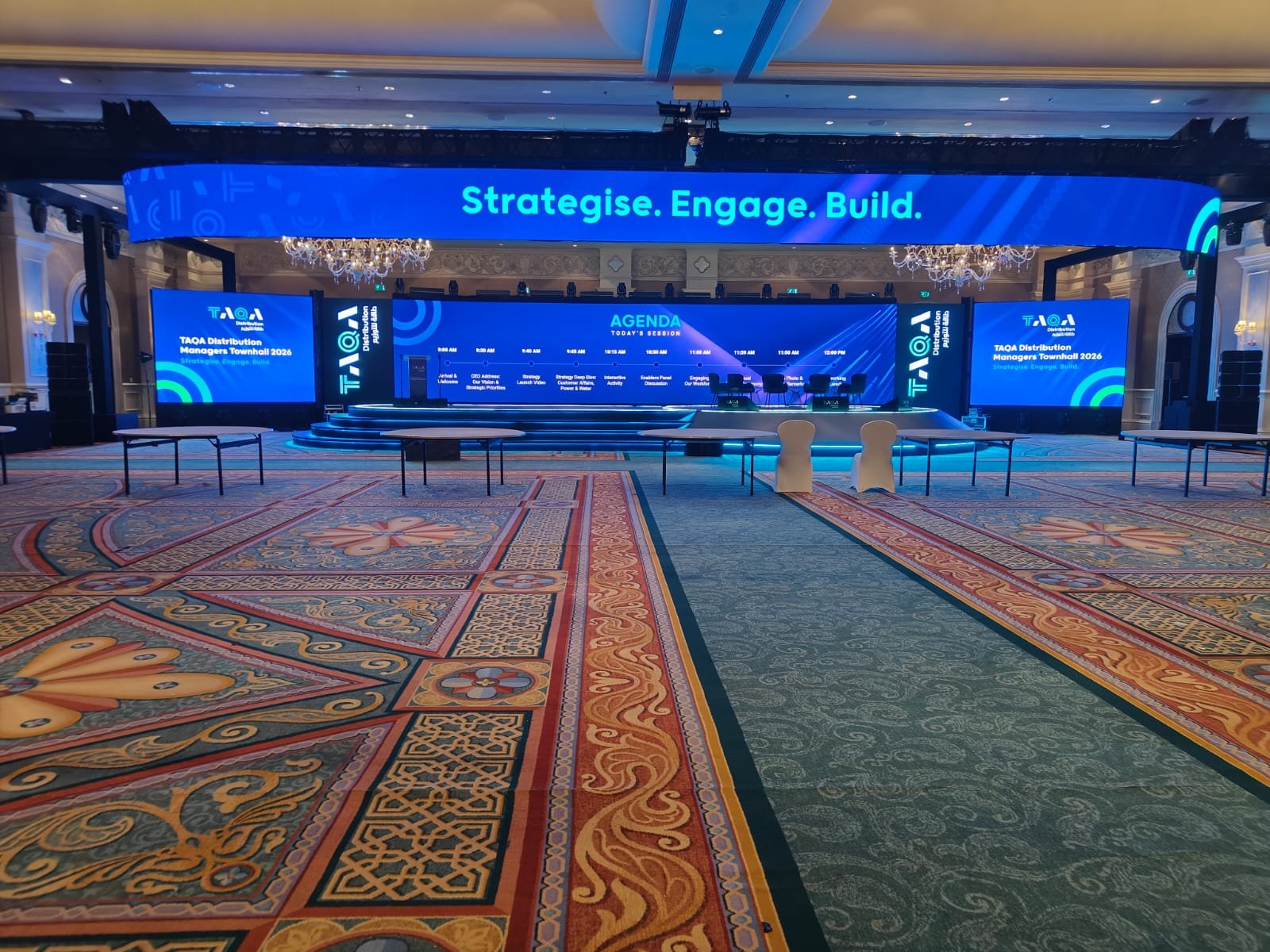 Custom corporate stage with integrated LED displays and lighting