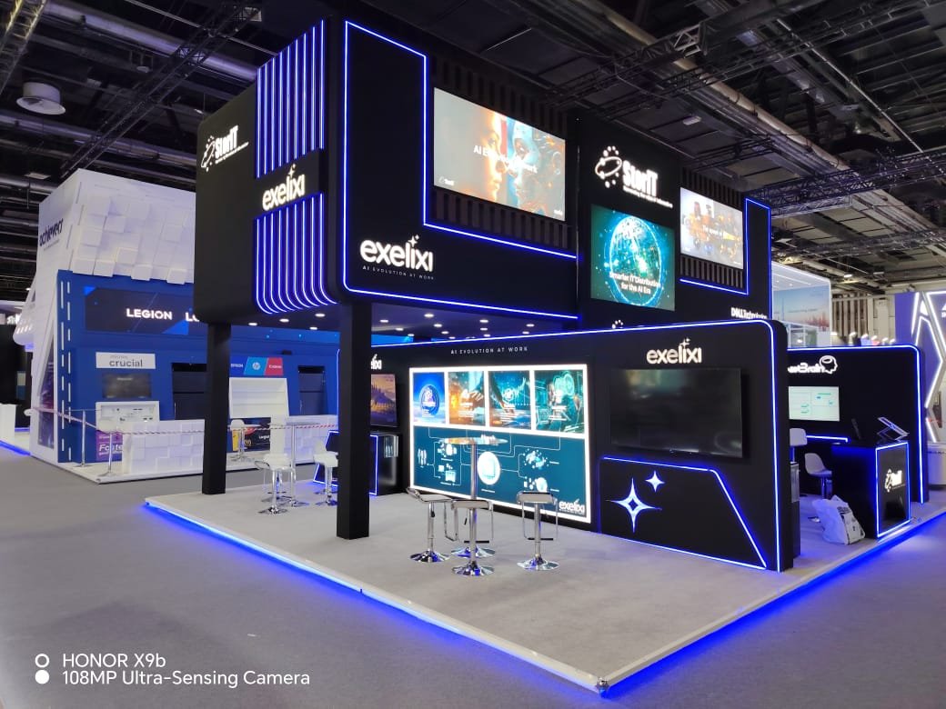 Exelixi AI pavilion with blue architectural lighting
