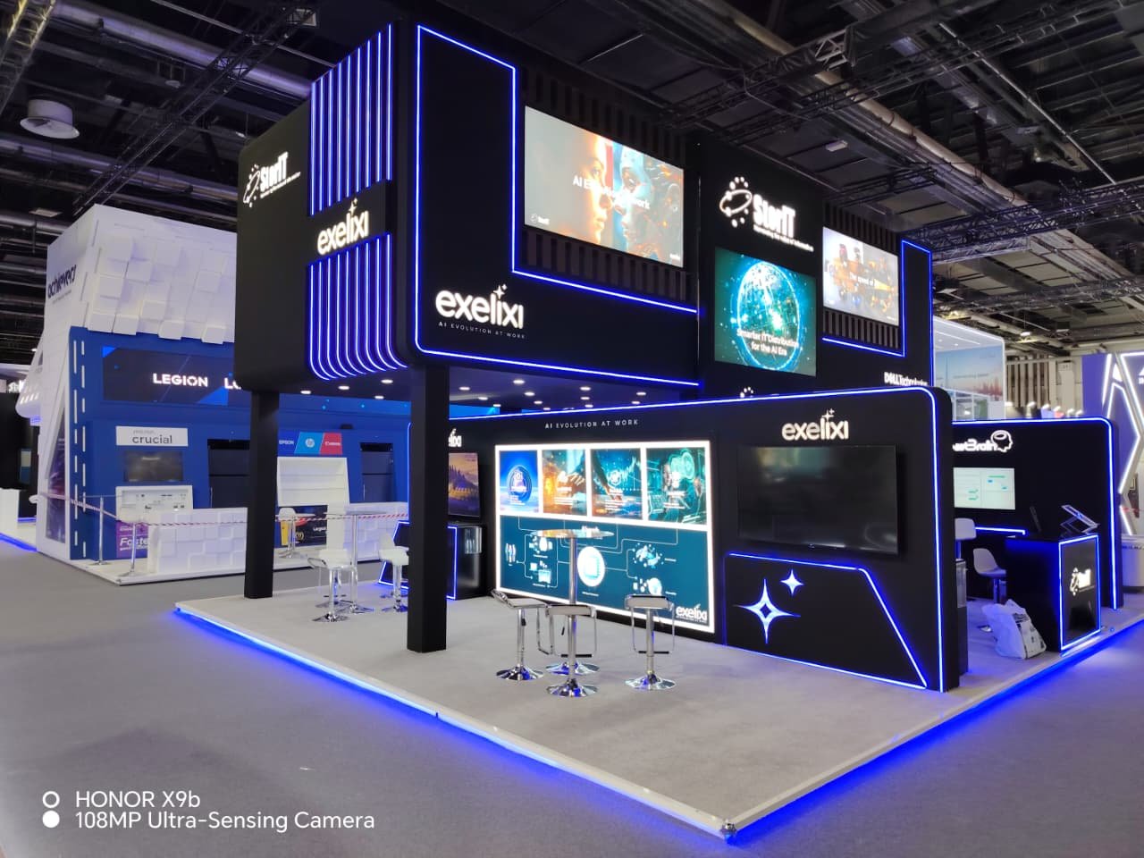 Exelixi AI pavilion with integrated screens and blue LED detailing