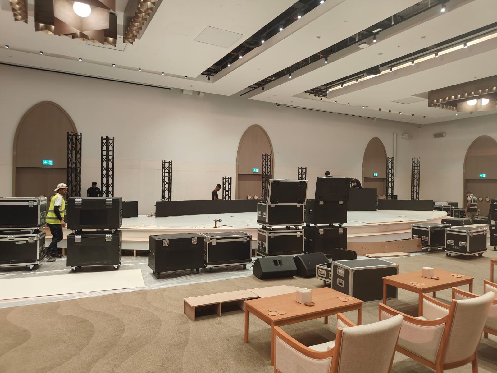 Conference stage construction with flight cases and technical equipment