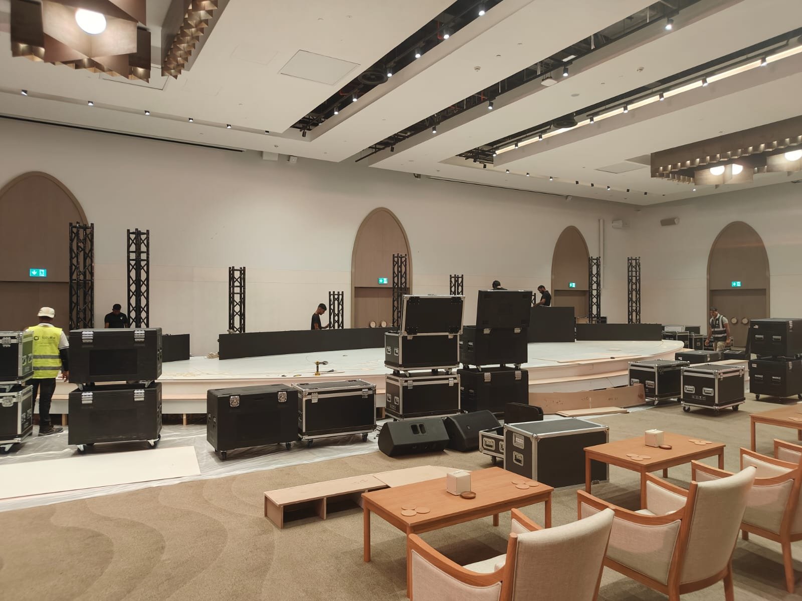 Technical crew installing a conference stage
